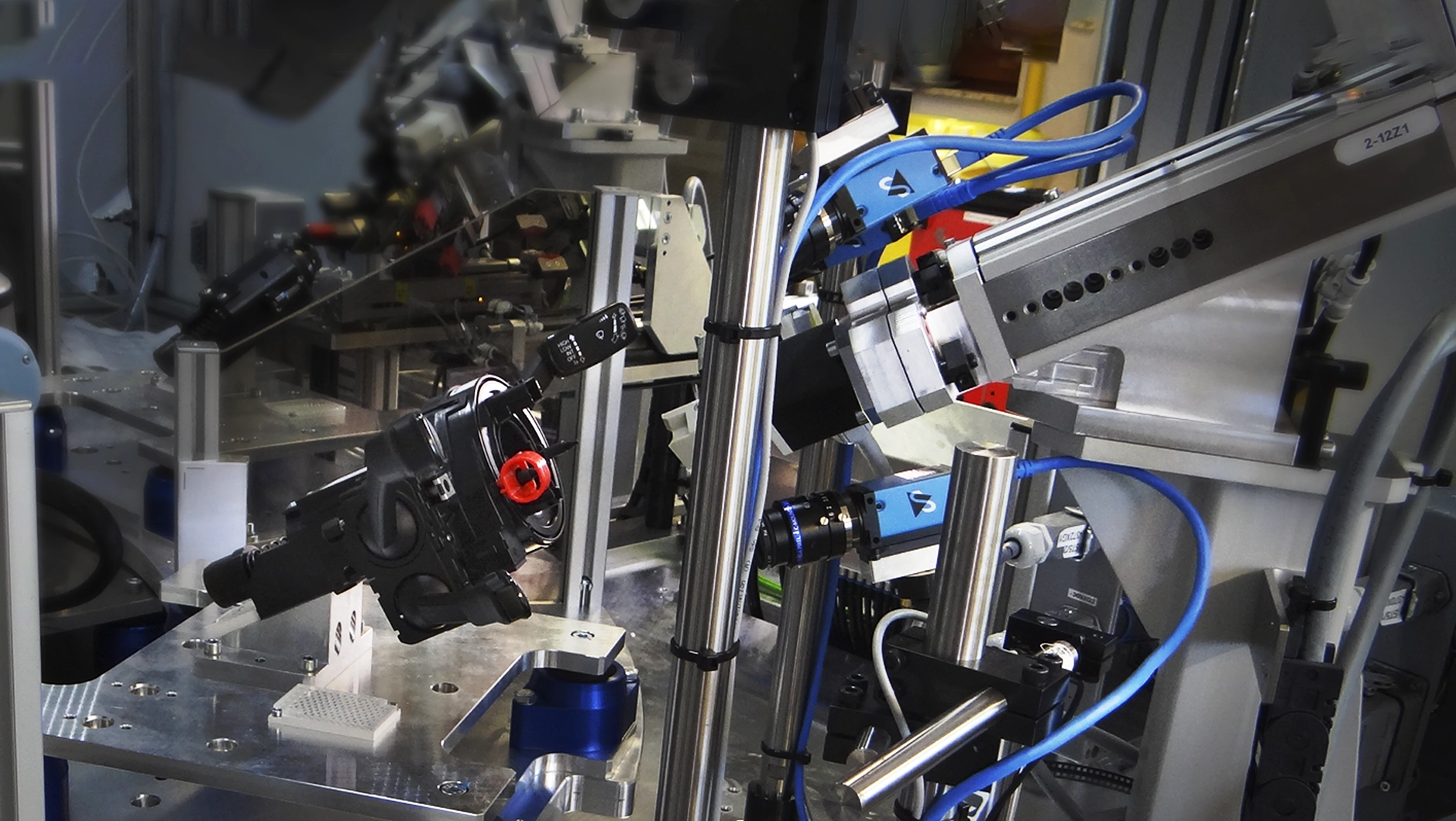A multi-camera vision inspection system from ITgroup for steering column testing uses cobots and industrial cameras to perform an array of inspection tasks on steering column components: presence detection, surface inspection, measurement, and image documentation. (Image courtesy of ITgroup.)