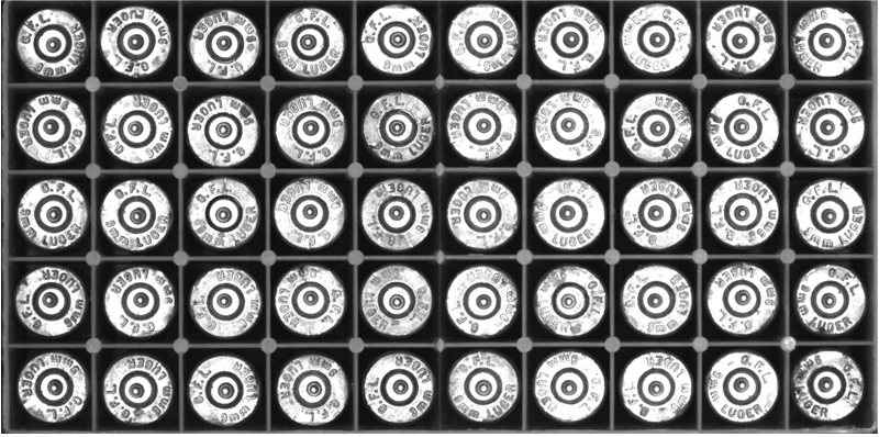 盒中的子弹在分发前须先经过编目，而透过光学字符辨识（OCR），机器视觉确保能准确且有效地执行任务。