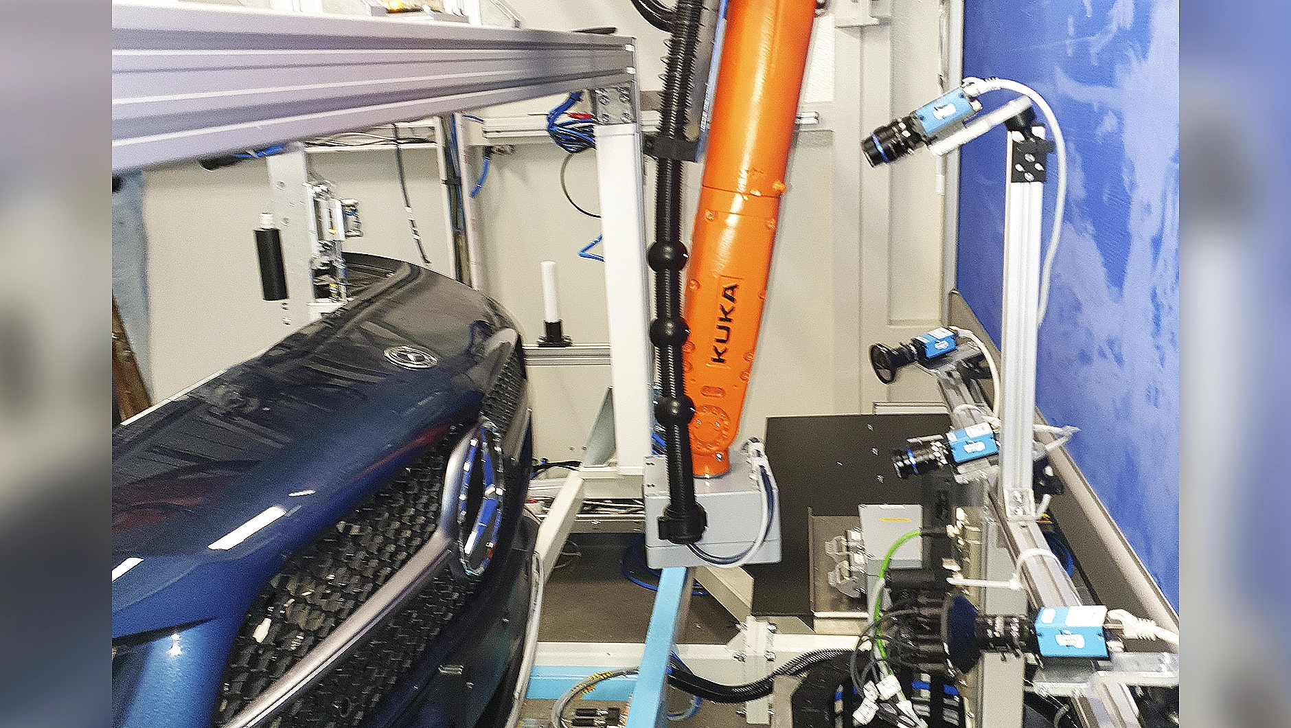 "Know how to test it": ITgroup's slogan underlines the complexity of the testing landscape. Here a multi-camera system and 3D-enabled robot inspect a car bumper for a variety of defects. (Image courtesy of ITgroup.)