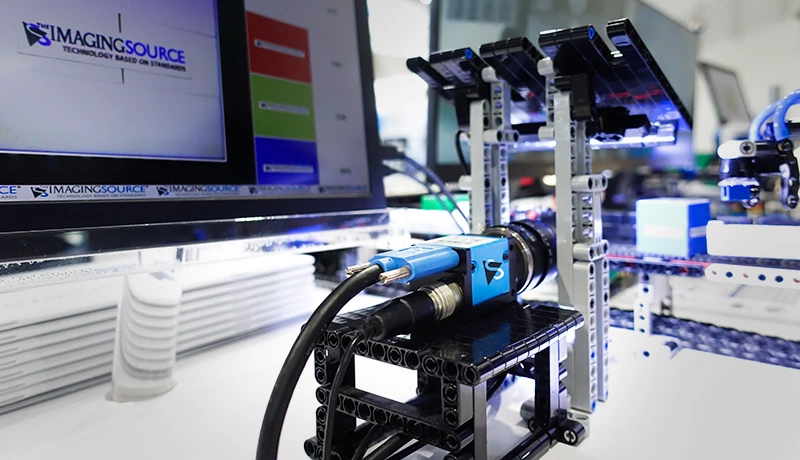 Toy factory demonstrates in-line inspection tasks: pattern match, color identification, barcode reading, and object counting.