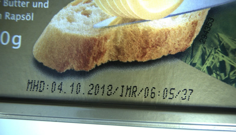 Fig. 1: Butter packaging: Image of dot-matrix characters in best-by date.